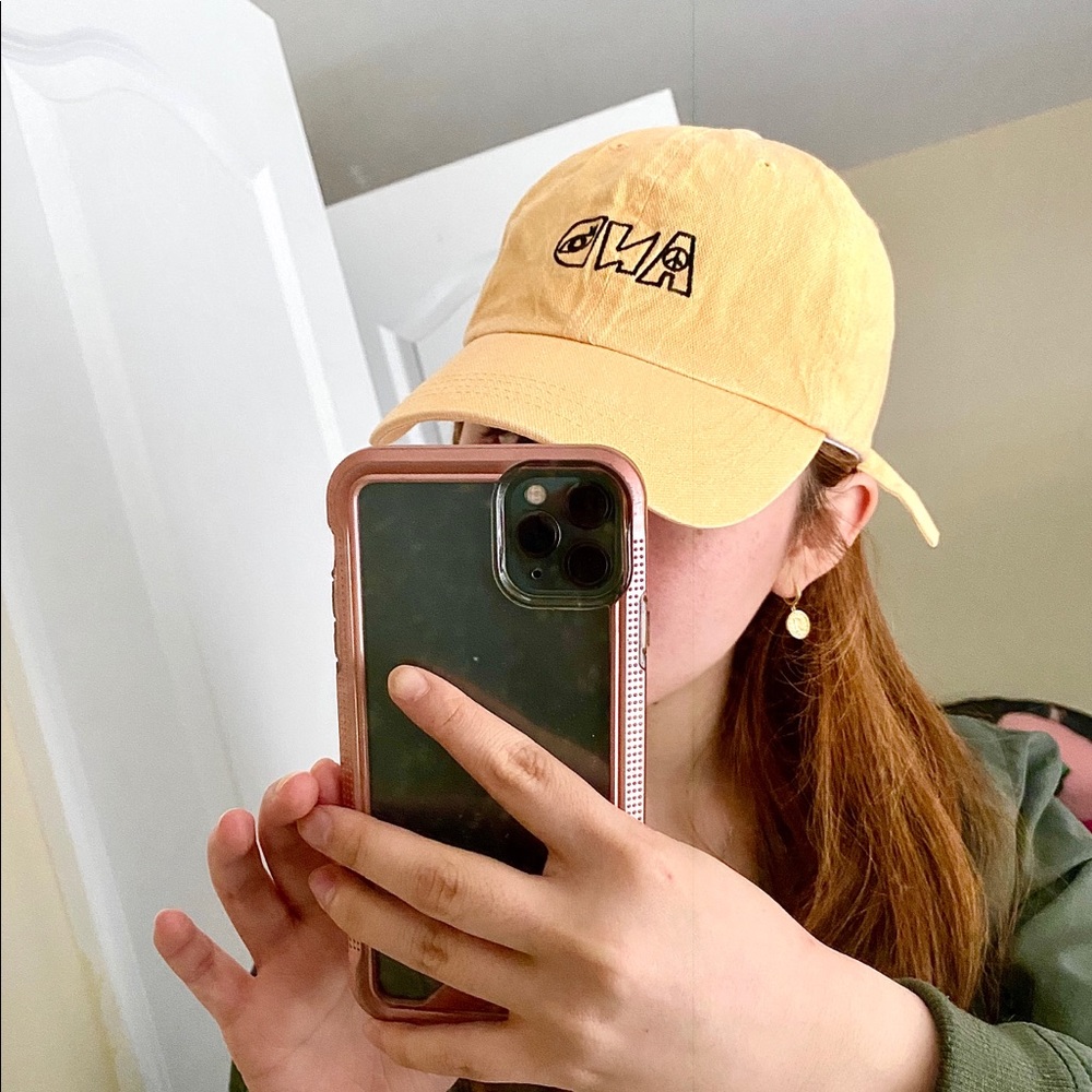 “AND” light orange hat ✨